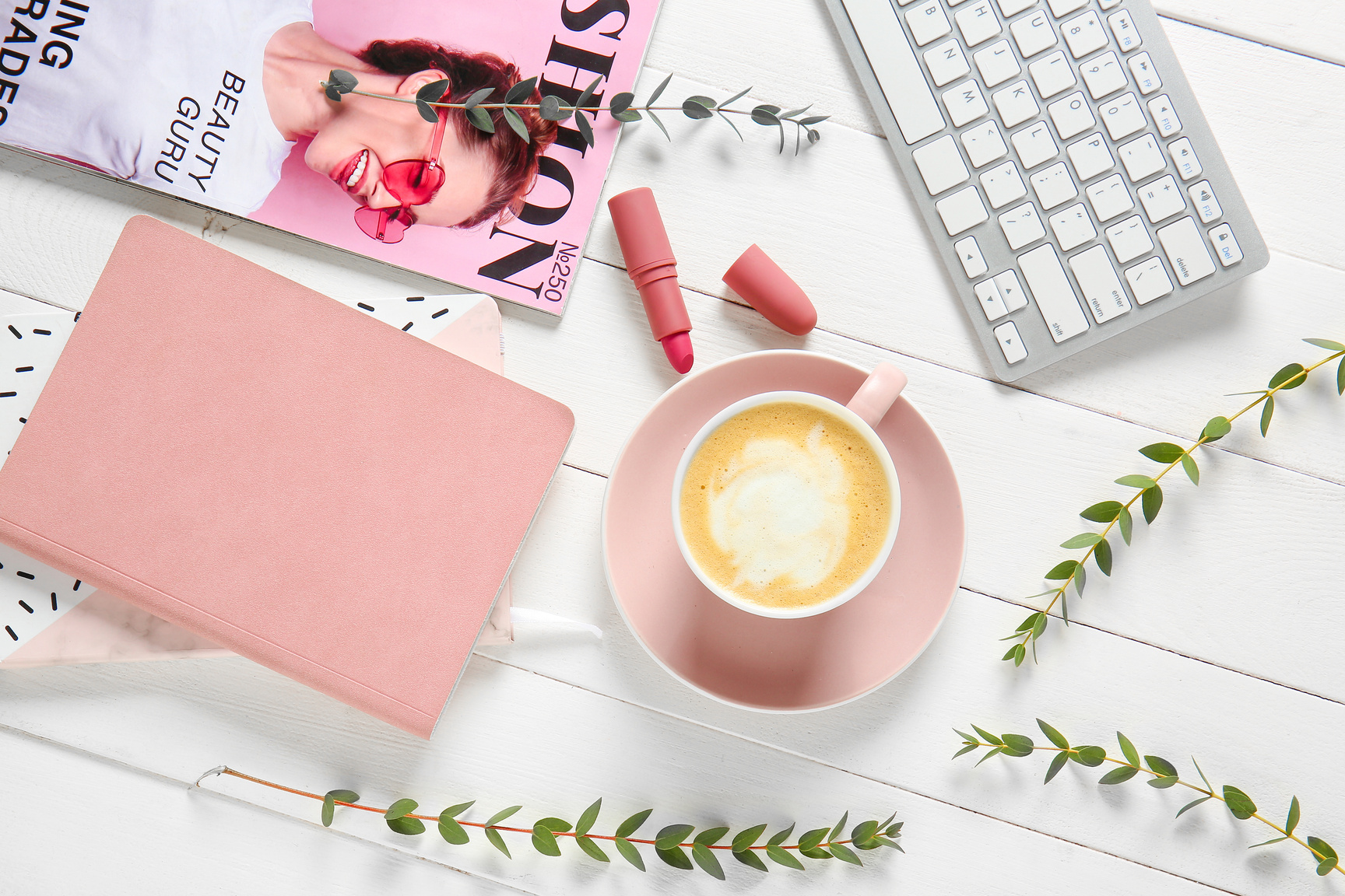 Cup of Coffee, PC Keyboard, Fashion Magazine and Cosmetics